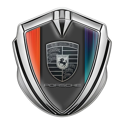 Porsche Emblem Auto Zeichen Silbertonfarbe mit Blau orangefarbene Haalften Basis und monochromes Logo