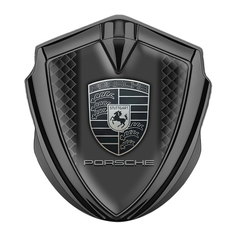 Porsche Selbstklebendes Metallaufkleber Emblem Graphit Tonfarbe mit Schwarze Quadrate Hintergrund