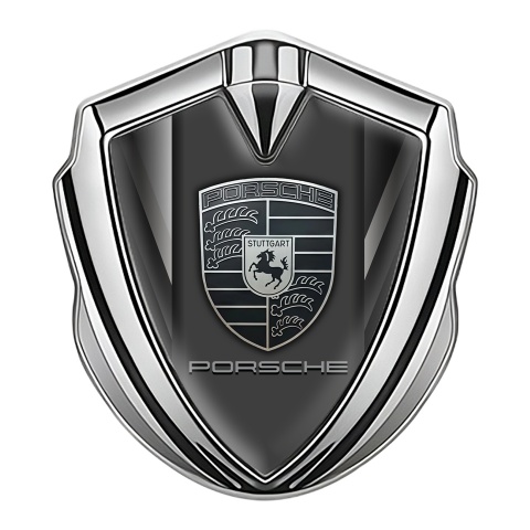Porsche Emblem Abzeichen Silbertonfarbe mit Symmetrische Linien Hintergrund und monochromes Logo