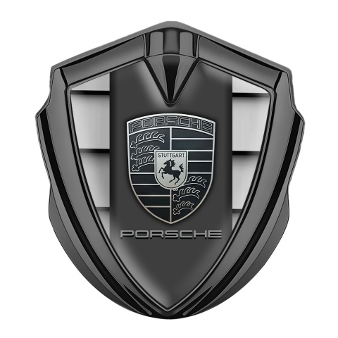 Porsche Seitenflugel Emblem Aufkleber Graphit Tonfarbe mit Stahllamellen Hintergrund Auflage