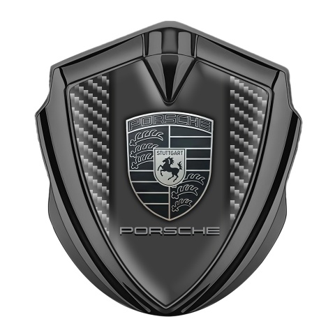 Porsche Selbstklebendes Metallaufkleber Emblem Graphit Tonfarbe mit Schwarz Kohlenstoff Hintergrund