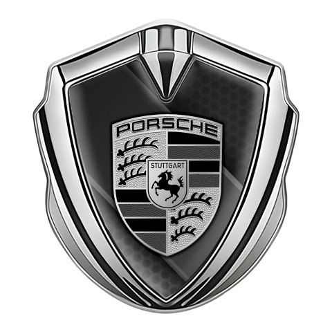 Porsche Seitenflugel Emblem Aufkleber Silbertonfarbe mit Graphit Diagonales Panel Hintergrund Stil