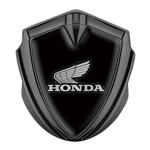 Honda Abzeichen selbstklebend Graphit Tonfarbe mit Schwarz Fundaments und Grau Logo Version