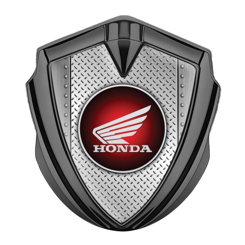 Honda Seitenflugel Emblem Aufkleber Graphit Tonfarbe mit Industriemetall Hintergrund und Rundes Logo
