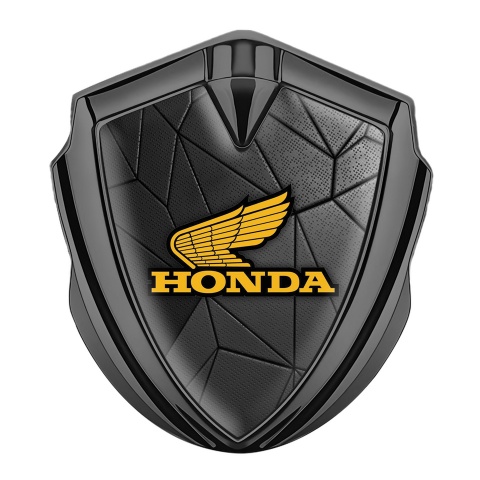 Honda Emblem Auto Zeichen Graphit Tonfarbe mit Dunkel Mozaik Hintergrund und Gelb Logo