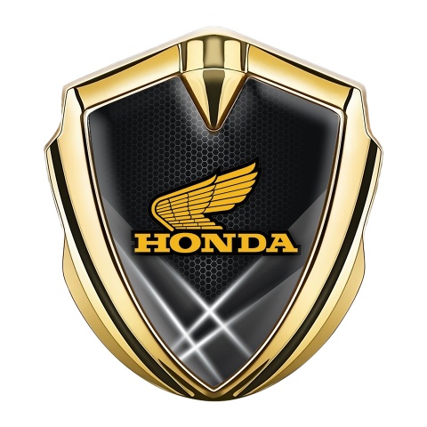 Honda Emblem Abzeichen Goldtonfarbe mit Lichteffekt Hintergrund und Gelb Logo