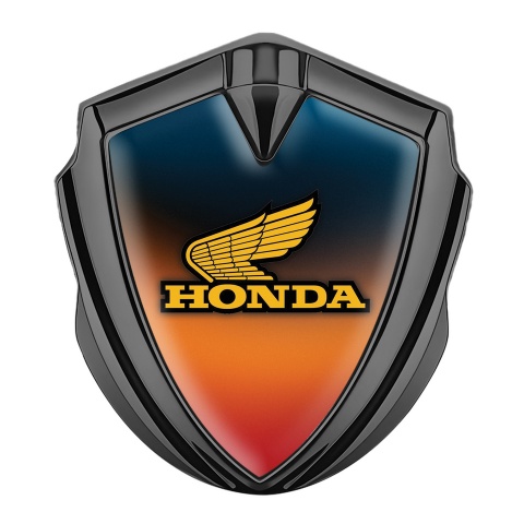Honda Abzeichen selbstklebend Graphit Tonfarbe mit Orange Blau Hintergrund