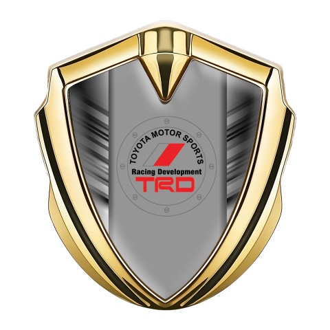 Toyota Emblem Auto Zeichen Goldtonfarbe mit Graue Kratzer Design und TRD Logo