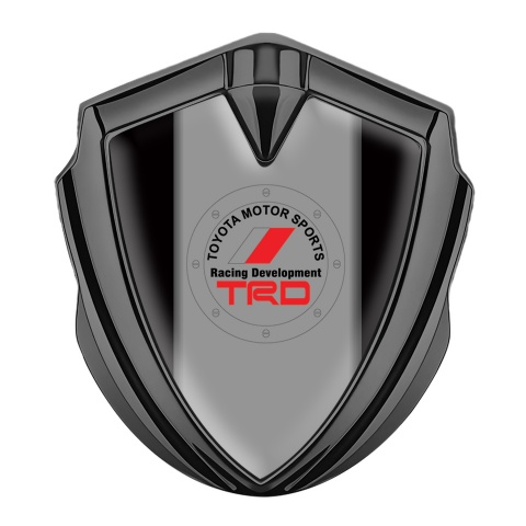 Toyota Emblem Abzeichen Graphit Tonfarbe mit Schwarz Fundament und TRD Logo