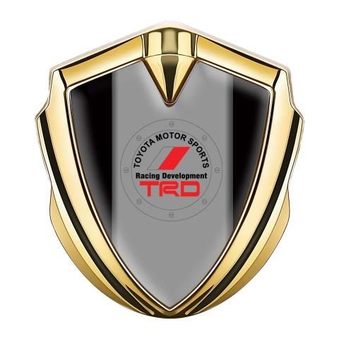 Toyota Emblem Abzeichen Goldtonfarbe mit Schwarz Fundament und TRD Logo
