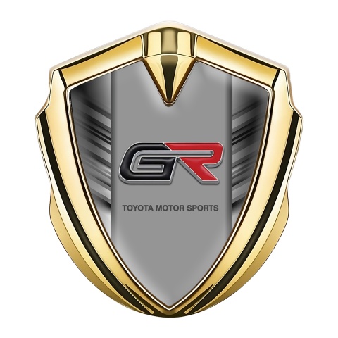 Toyota GR Emblem Abzeichen Goldtonfarbe mit Zerkratzte Basis Effekt und Sport Logo