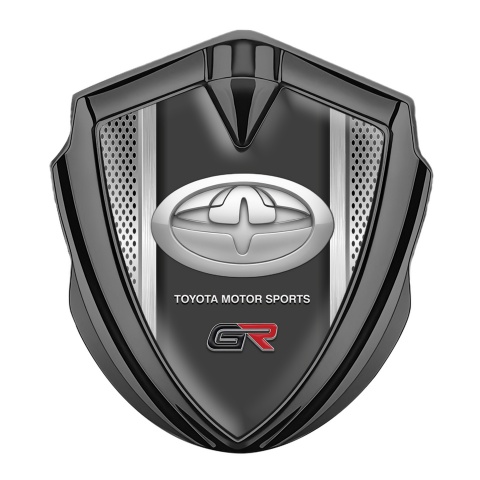 Toyota GR Emblem Abzeichen selbstklebend Graphit Tonfarbe Feinmaschig Hintergrund und Modern Logo