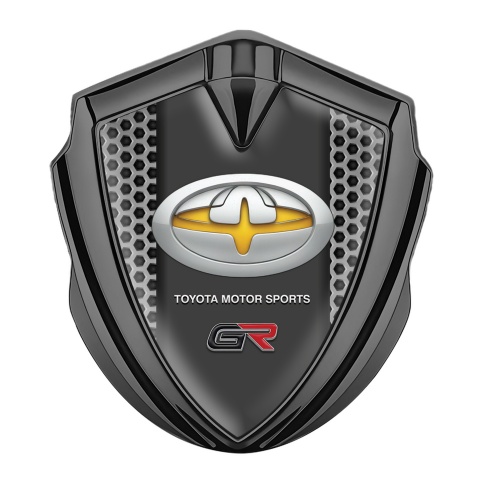 Toyota GR Emblem Auto Zeichen Graphit Tonfarbe mit Gittereffekt und Modern logo mit Gelb Motiv