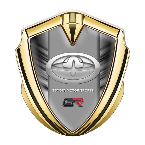 Toyota GR Emblem Abzeichen Goldtonfarbe mit Graue Kratzer Effekt Basis und Tuning Logo Stil