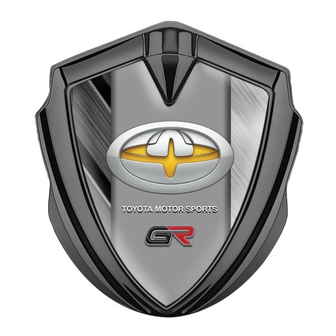 Toyota GR Emblem Abzeichen Graphit Tonfarbe mit Polierte Elemente der Basis und Gelb Logo Motiv