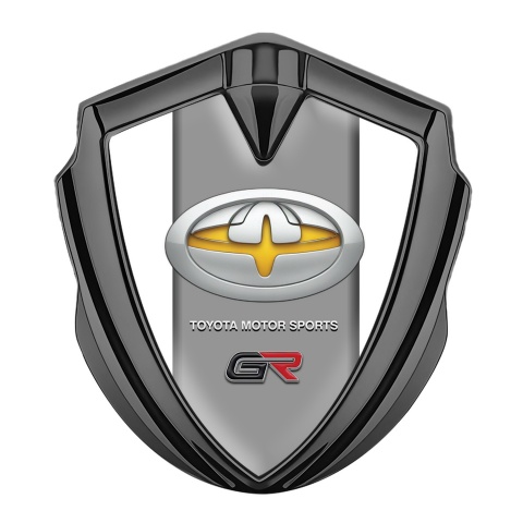 Toyota GR Abzeichen selbstklebend Graphit Tonfarbe mit Weiss Fundament und Neues Design Logo