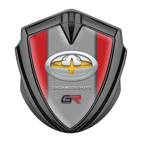 Toyota GR Emblem Abzeichen selbstklebend Graphit Tonfarbe mit Rote Fundament und Neues Design Logo