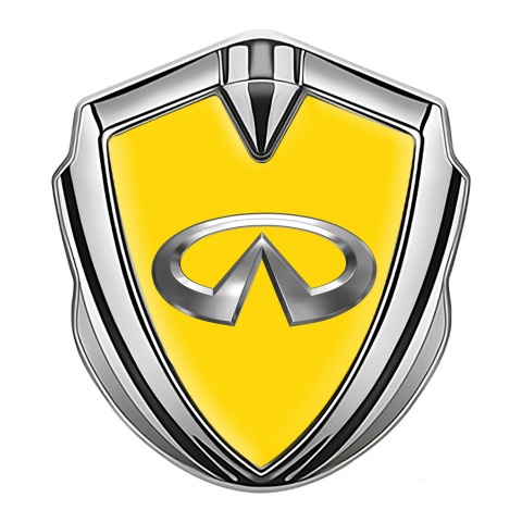 Infiniti Emblem Abzeichen Silbertonfarbe mit Gelb Fundament und Chrom logo