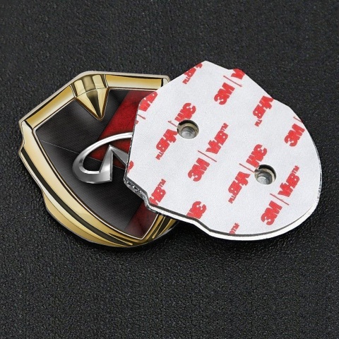 Infiniti Emblem Abzeichen selbstklebend Goldtonfarbe mit Rote Schwarz Gemischte Textur Stil