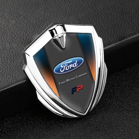 Ford FP Abzeichen selbstklebend Silbertonfarbe mit Schillerndes Orangeblau Hintergrund und Craphit Logo Panel
