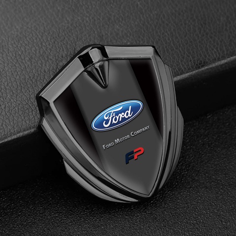 Ford FP Emblem Abzeichen selbstklebend Graphit Tonfarbe mit Schwarz Hintergrund und Blau Logo