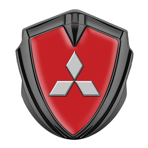 Mitsubishi Emblem Abzeichen Graphit Tonfarbe mit Rote Hintergrund und Klassisch Logo