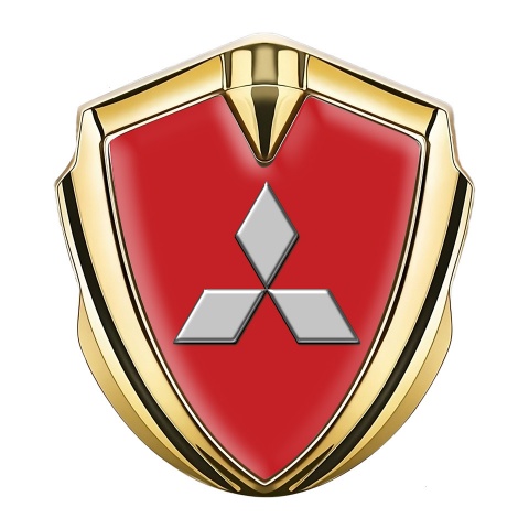 Mitsubishi Emblem Abzeichen Goldtonfarbe mit Rote Hintergrund und Klassisch Logo