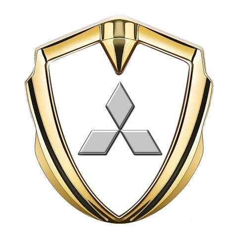 Mitsubishi Emblem Abzeichen selbstklebend Goldtonfarbe mit Weiss Hintergrund und Grau logo