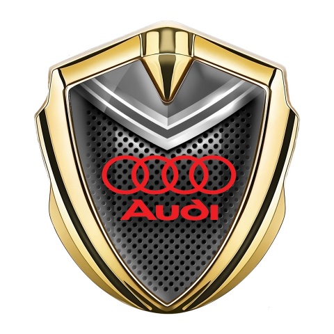 Audi Abzeichen selbstklebend Goldtonfarbe mit Grau Helm Effekt und Rote Logo