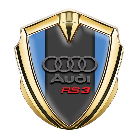 Audi RS3 Emblem Abzeichen selbstklebend Goldtonfarbe mit Eisblau Hintergrund Design und Graphit Logo