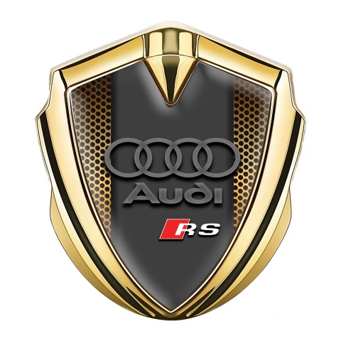 Audi RS Abzeichen selbstklebend Goldtonfarbe mit Orange Perforiertes Metall Basis design