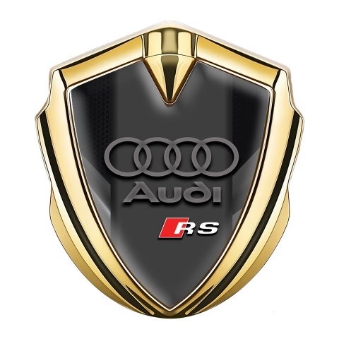 Audi RS Emblem Abzeichen selbstklebend Goldtonfarbe mit Schwarz Grau Elemente Design