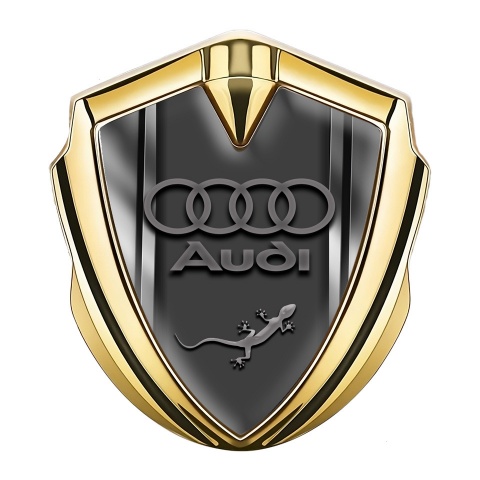 Audi Abzeichen selbstklebend Goldtonfarbe mit Metallrahmen Basis Effekt und Eidechse Logo