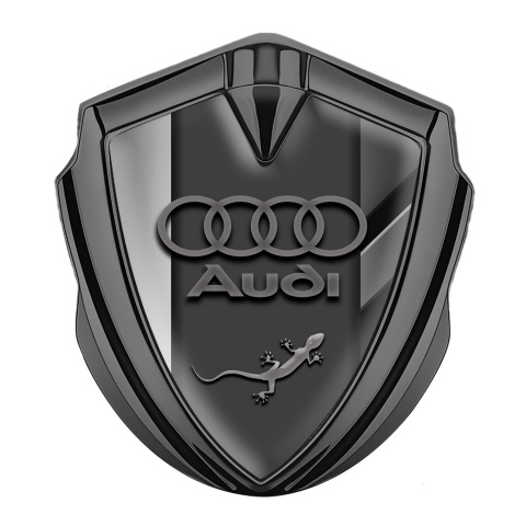 Audi Quattro Emblem Abzeichen selbstklebend Graphit Tonfarbe mit Polierte Platte und Eidechse Logo Stil