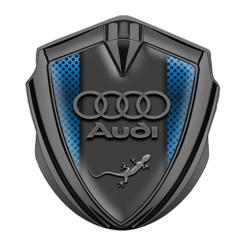 Audi Quattro Emblem Auto Zeichen Graphit Tonfarbe mit Blau Netzwerk Hintergrund Design und Eidechse Logo