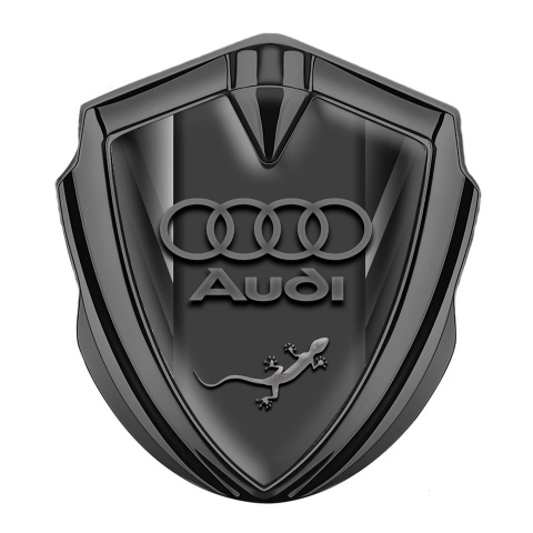 Audi Quattro Seitenflugel Emblem Aufkleber Graphit Tonfarbe mit Grau Fragmente und Eidechse Logo