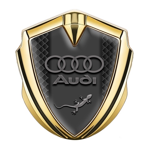 Audi Quattro Emblem Abzeichen selbstklebend Goldtonfarbe mit Schwarze Quadrate Fundaments design