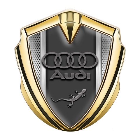 Audi Quattro Selbstklebendes Metallaufkleber Emblem GoldtonfarbeGraphit Tonfarbe mit Metallgeflecht Effekt Hintergrund