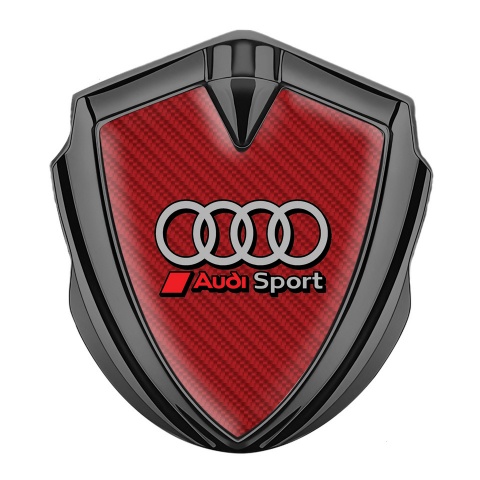 Audi Seitenflugel Emblem Aufkleber Graphit Tonfarbe mit Rote Carbon Hintergrund und Sport Logo