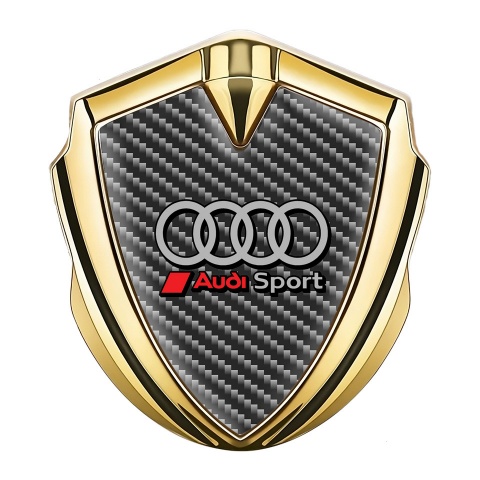 Audi Sport Emblem Abzeichen selbstklebend Goldtonfarbe Dunkel Kohlenstoff Hintergrund Auflage