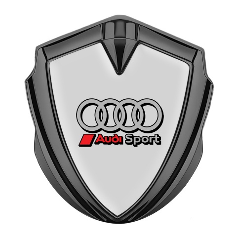 Audi Emblem Auto Zeichen Graphit Tonfarbe mit Grau Hintergrund und Sport Kreise Auflage