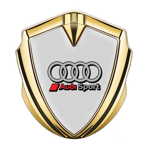 Audi Emblem Auto Zeichen Goldtonfarbe mit Grau Hintergrund und Sport Kreise Auflage