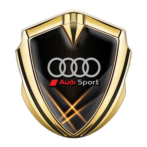Audi Sport Emblem Abzeichen Goldtonfarbe mit Orange Lichter Hintergrund Design