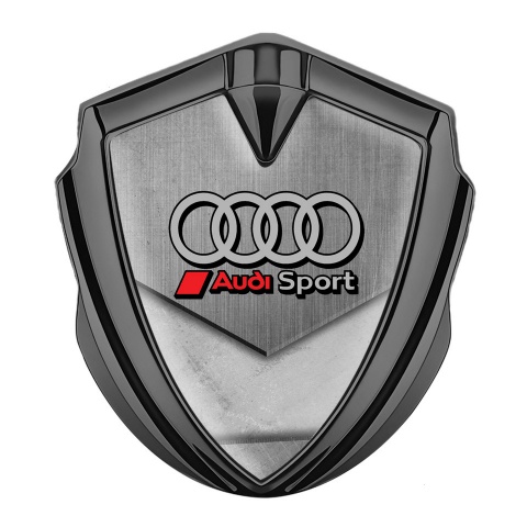 Audi Sport Emblem Aufkleber Autozubehor Graphit Tonfarbe mit Polierte Steinstruktur Hintergrund