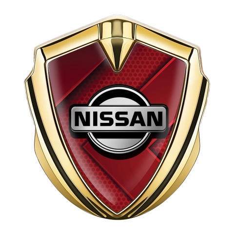 Nissan Emblem Auto Zeichen Goldtonfarbe Rote Elemente mit Grau Logo