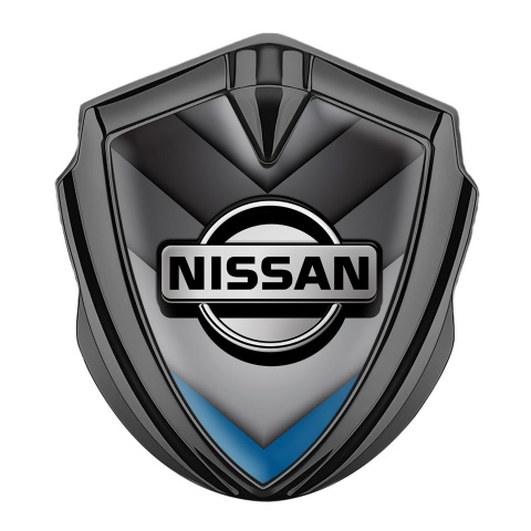 Nissan Emblem Auto Zeichen Graphit Tonfarbe V Form Design mit Blau Motiv