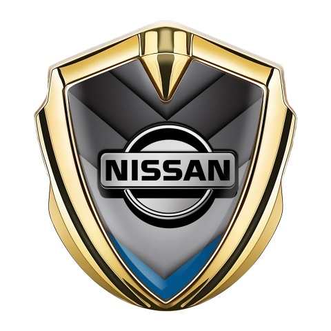 Nissan Emblem Auto Zeichen Goldtonfarbe V Form Design mit Blau Motiv