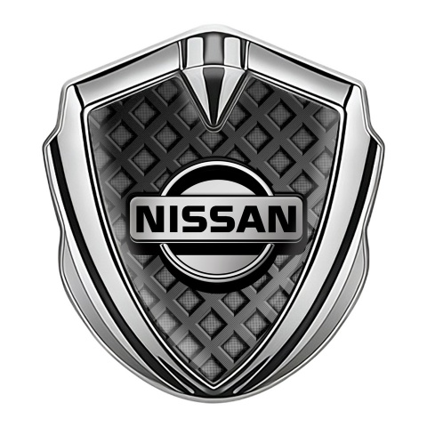 Nissan Emblem Auto Zeichen Silbertonfarbe Dunkles Gitter mit Grau Logo