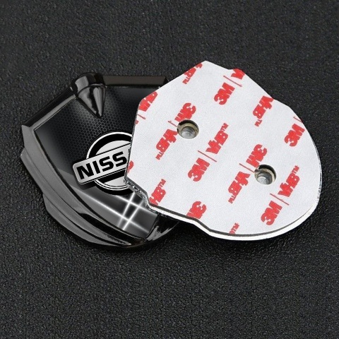 Nissan Emblem Logo Schriftzug Aufkleber Graphit Tonfarbe Dunkles Fundament mit Weiss Lichter Effekt