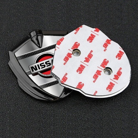 Nissan Emblem Auto Zeichen Graphit Tonfarbe mit Metalllamellen Design
